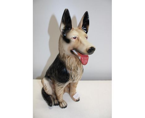 A ceramic Alsatian figure - 35cm tall 