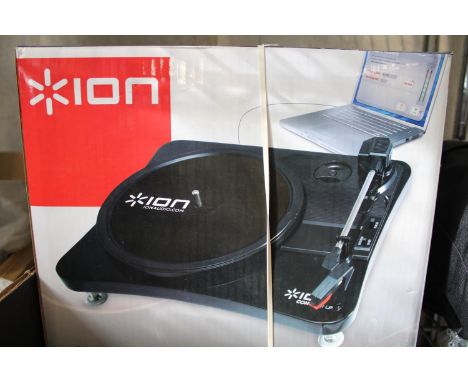 A boxed compact vinyl to MP3 turntable 