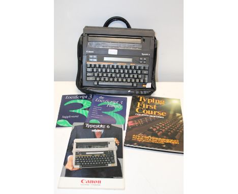A Canon electric typewriter &amp; books etc 