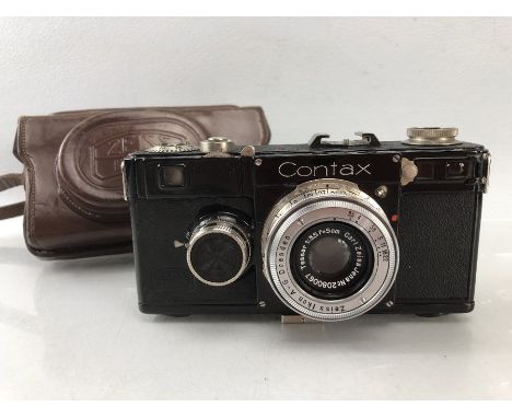 Vintage Zeiss Ikon black Rangefinder Contax camera with Carl Zeiss Jana Tessar 5cm F/3.5 lens. Clean and good working order