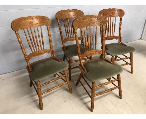 Set of four pine country cottage style stick back dining chairs with upholstered seats