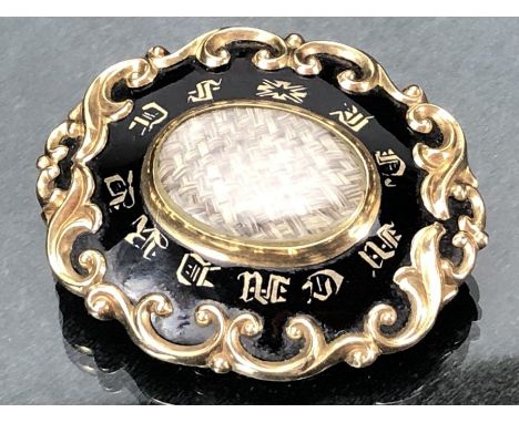 Victorian Gold coloured mourning Brooch with woven strands of hair and Black enamel with Gold letters "In Memory"