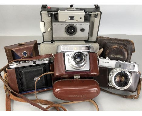 Collection of four vintage cameras to include Polaroid 103 Land Camera, Baldix Balda, Minolta Hi-Matic 7 and a Montanus Rocca