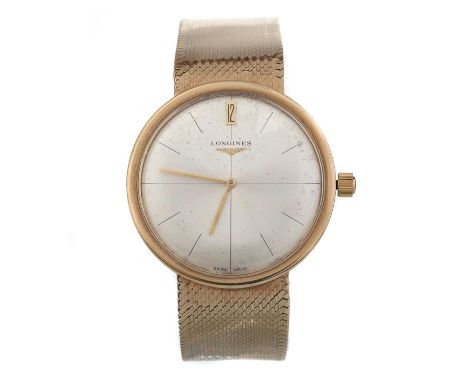 LONGINES NINE CARAT GOLD MANUAL WIND WRIST WATCH,  the round dial with baton hour markers, 33mm case, on a nine carat gold br