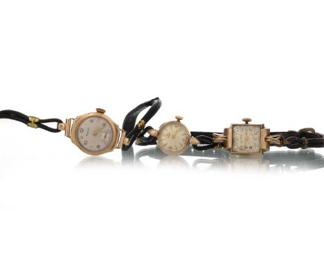 THREE GOLD CASED WRIST WATCHES, comprising Rotary, Tissot and Baume, two on black leather strapsEach heavily worn.