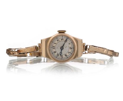 NINE CARAT GOLD MANUAL WIND WRIST WATCH,  the round dial with Arabic hour markers, 16mm case, on a nine carat gold expanding 