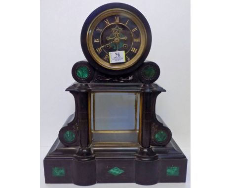 *Clock. A Victorian black slate mantel clock,  the architectural case inset with malachite roundels, the circular dial with r