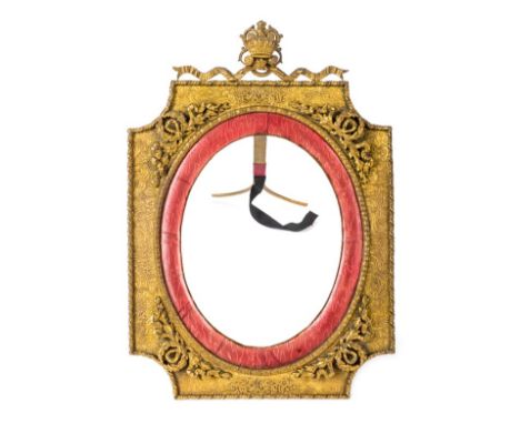 *Photograph frame. A late 19th-century French gilt metal photograph frame,  with oval pink enamel finely decorated with guill