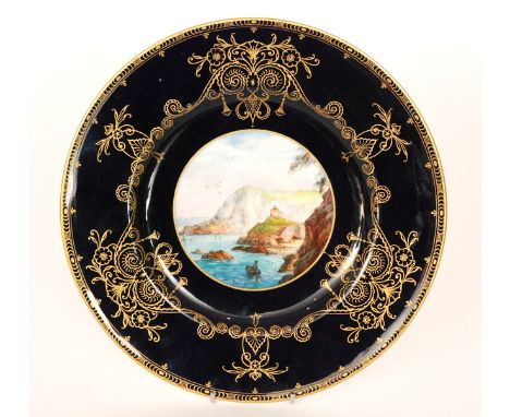 A late 1920s Royal Worcester cabinet plate decorated with a hand painted roundel depicting Lantern Hill, Ilfracombe by J. Wal