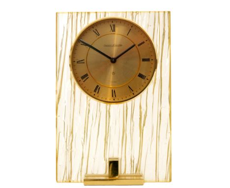 A 1960s and 1970s Jaeger - Le Coultre eight day mantle clock in yellow bark effect resin case, height 17.5cm