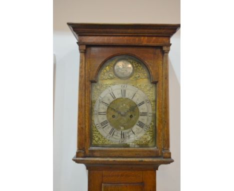 An early 19th Century oak Longcase clock by Joseph Men Blandford, with eight day striking movement silvered chapter ring and 