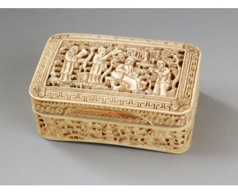 An early 19th Century rectangular ivory snuff box intricately carved with four figures in a garden setting to the hinged cove