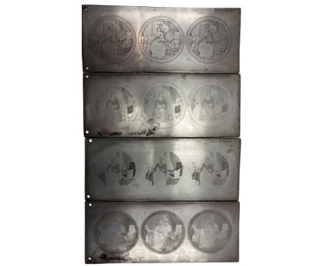 A set of four early 20th Century zinc over copper lithograph printing plates each engraved with stages for the printing of 'T