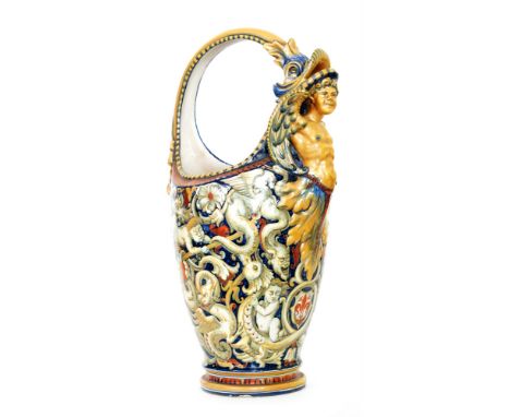 A large early 20th Century Cantagalli pedestal basket vase decorated in the Renaissance style with cherubs, stylised birds an