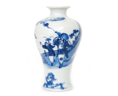 A Chinese Qing Dynasty 18th Century porcelain vase of baluster form hand painted in underglaze blue with a sage and attendant