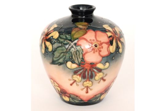 A Moorcroft Pottery Vase Decorated In The Oberon Pattern Designed