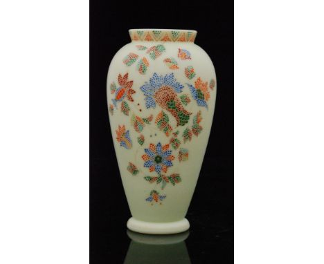 A late 19th Century Harrach glass vase of footed shouldered form with a short collar neck decorated with dotted enamelling of