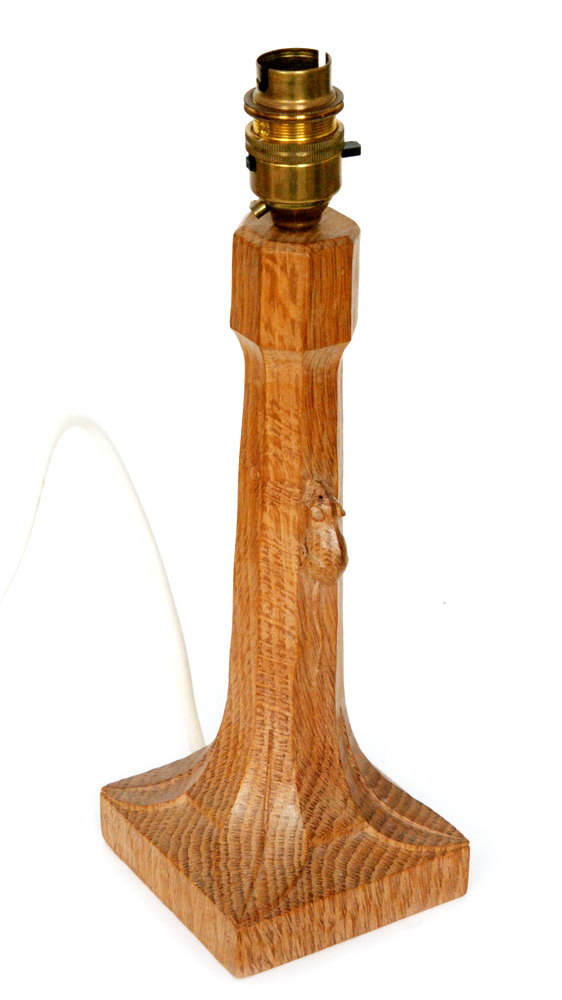 A Robert 'Mouseman' Thompson oak table lamp base, the shaped column to