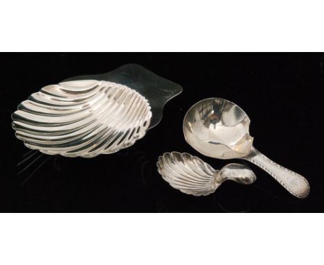 A George III hallmarked silver caddy spoon with fluted bowl and bright cut handle, London 1790 Hester Bateman, another with f