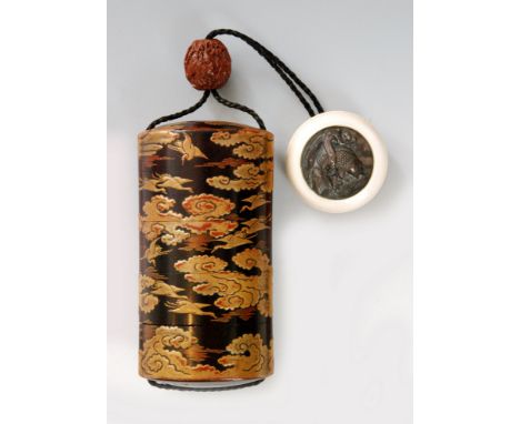 A late 18th Century four case roiro inro decorated in gold takamakie with cranes drifting through clouds touched in red detai