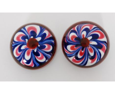 A pair of 20th Century Marbrie pattern glass paperweights in the manner of Cape Cod Glass Works, decorated with pulled loops 