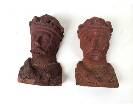 A pair of terracotta corbels in the form of Medieval knights, both stamped Maidenhead Brick &amp; Tile Co 