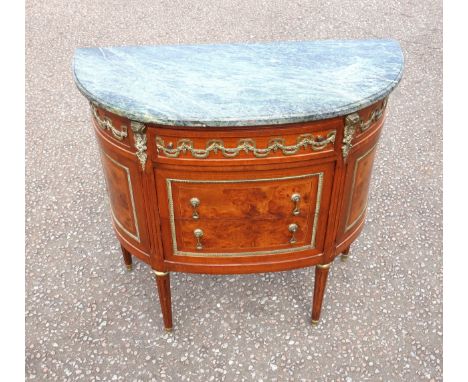 French Louis XVI style mahogany and burr walnut demi-lune commode with a green veined marble top, 3 central drawers below, an