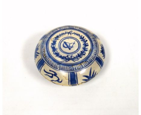Chinese ceramic circular bowl painted with blue and white floral decoration, the cover with initials "V O C" for the Dutch Ea
