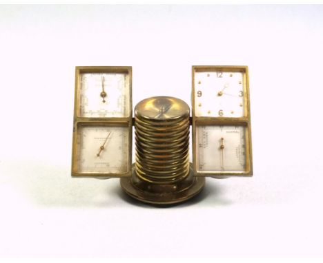 Swiss Imhof gilt metal desk compendium comprising a ringed column with compass top flanked by a barometer with a square dial 