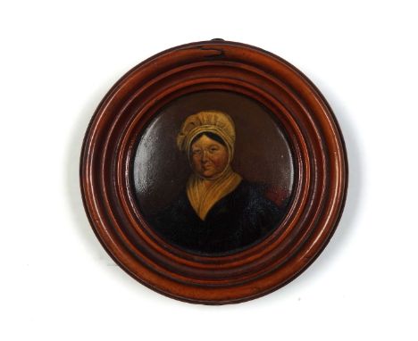 Samuel Raven (1775-1847), Portrait of a woman wearing a mob-cap, oil on papier-mâché, signed and inscribed on the reverse, ci