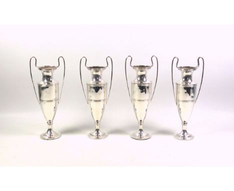 Set of 4 George V silver vases, each of urn form, with 2 reeded strap handles, reeded band decoration, on a circular pedestal
