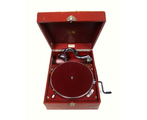 HMV wind-up portable record player, complete with key. Retailed by Harrods.