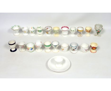 Collection of 22 Edwardian and later ceramic egg cups comprising Royal Crown Derby "Derby Posies" cup, Copeland Spode for Har