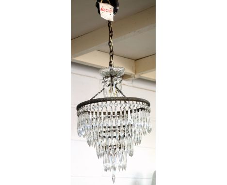 Early to Mid 20th Century brass corona light with 4 tiers supporting glass prismatic drops, Dia.28.5cm, and a gilt brass hang