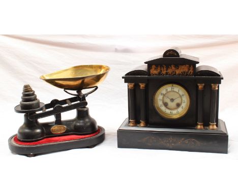 A Victorian slate mantle clock, together with a set of iron and brass scales and weights.