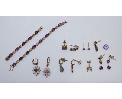 Six pair of 9ct gold amethyst and opal earrings, together with a 9ct gold amethyst bracelet.  15.06grms gross. (one pair of e