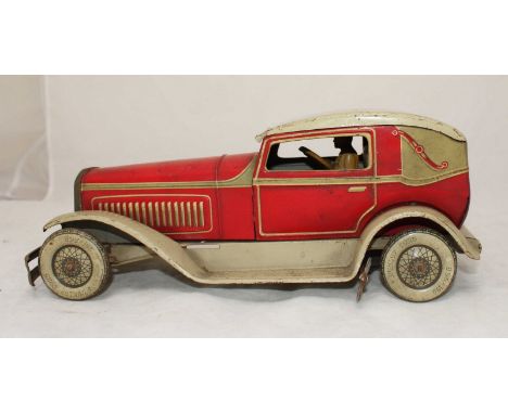 A German clockwork tinplate car, 1920s style, lithographed with Dunlop tyres