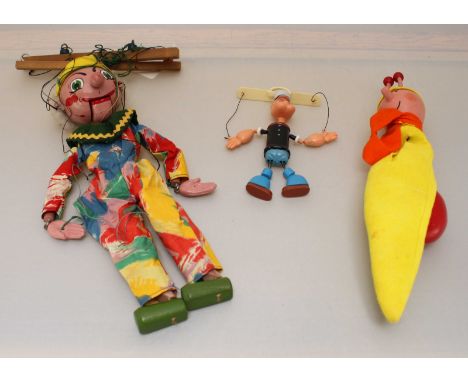 A Pelham Puppets 'Brian Snail' finger puppet, Pelham 'Clown' puppet and small plastic Popeye marionette puppet (3)