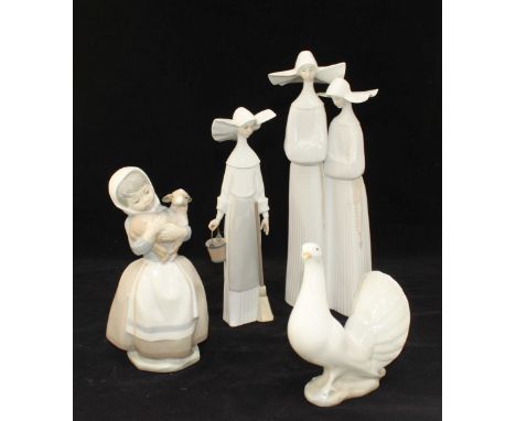 A Lladro porcelain figure-group depicting two nuns and a single Lladro figure of a nun, together with a NAO ceramic figure of