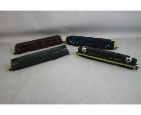 FOUR BOXED LIMA LOCOMOTIVES 'OO GAUGE' to include 205105 The Green Howards, 205144 Express Parcels, 205134 Western Pioneer, 2