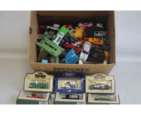 A COLLECTION OF BOXED AND LOOSE DIECAST VEHICLES to include Dinky, Corgi, Matchbox, Burago, Maisto and Lledo