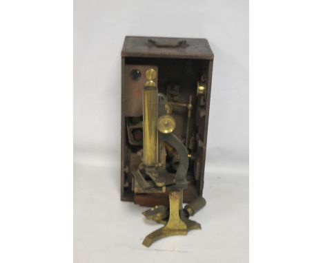 A 19TH CENTURY LACQUERED BRASS MONOCULAR MICROSCOPE, in fitted wooden case with a selection of lens etc