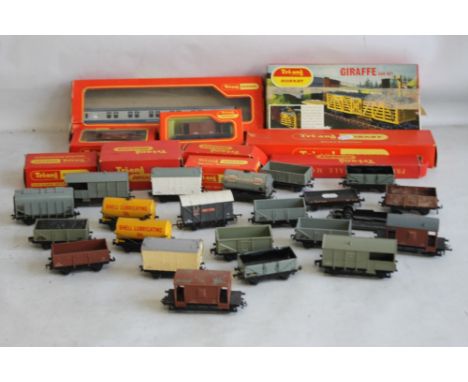 TWENTY-TWO UNBOXED PIECES OF ROLLING STOCK TO INCLUDE COVERED, UNCOVERED WAGONS AND TANKERS 'OO GAUGE',  plus six boxed Hornb
