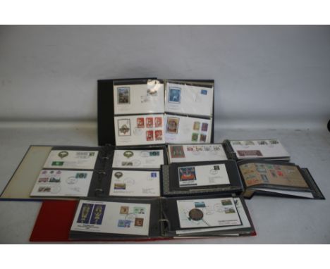 FIVE ALBUMS OF FIRST DAY AND COMMEMORATIVE COVERS, to include railway types and a selection from Iran (Approx 160). 