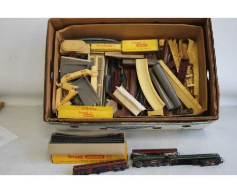 A BOX CONTAINING TRIANG TT SCALE, LOCOMOTIVES with carriages, track, platforms etc.