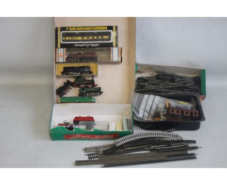 FIVE UNBOXED N GAUGE STEAM LOCOMOTIVES together with two Diesel locomotives by Wrenn, Lima Lone Star etc. plus N gauge track,