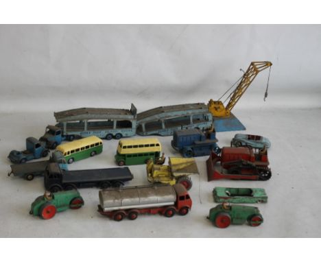 FIFTEEN UNBOXED PLAYWORN DINKY TOYS, to include car transporter, steam roller, Foden tanker, coach, bus, earthmover, car, tru