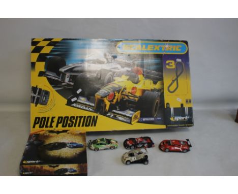 A BOXED SCALEXTRIC POLE POSITION SET to include Williams BMC No. 10 and Jordan Honda No. 9 cars together with a collection of