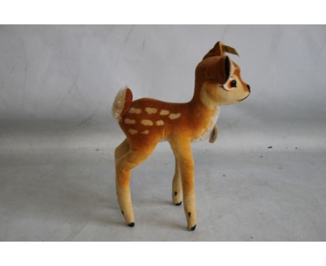 A VINTAGE "'STEIFF BAMBI"' with card tag attached height 23 cm.