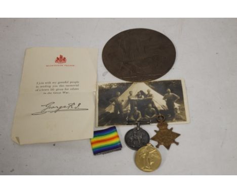 WWI CASUALTY MEDAL GROUP CONSISTING OF A 1914/1915 STAR TRIO NAMED 3742 PTE T HOWELL, S STAFF R, together with a Memorial pla